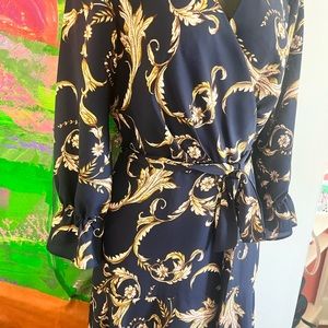 Wrap waist Tahari dress navy blue with brown leaf  design.